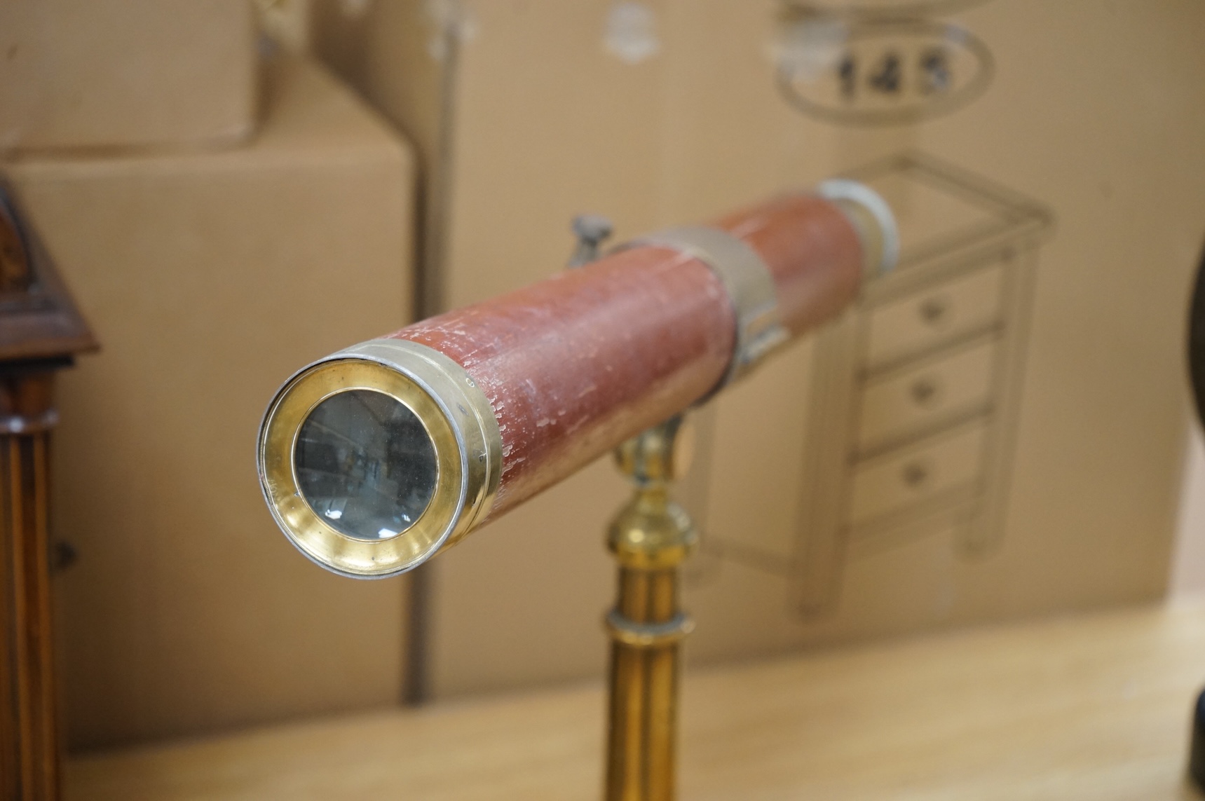 A 19th century single draw telescope by Wilson of London, on brass tripod